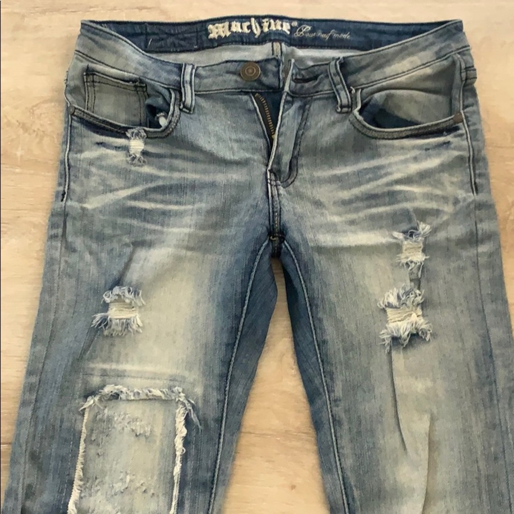 Machine distressed jeans